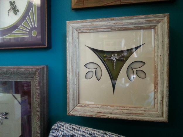 Created with scrap moulding and matting, John Barlow frames small dragonfly pins!