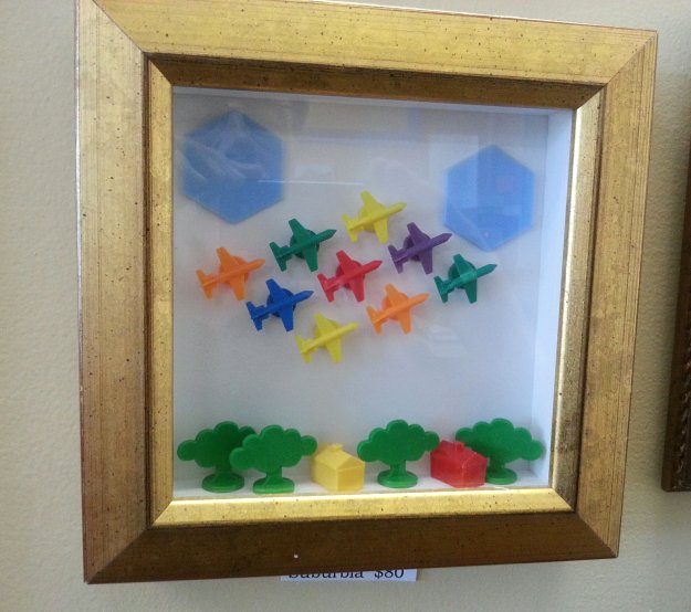 Using scrap moulding to create this fun and inexpensive mini shadowbox frame was seen at Casco Bay Frames & Art in Portland, Maine